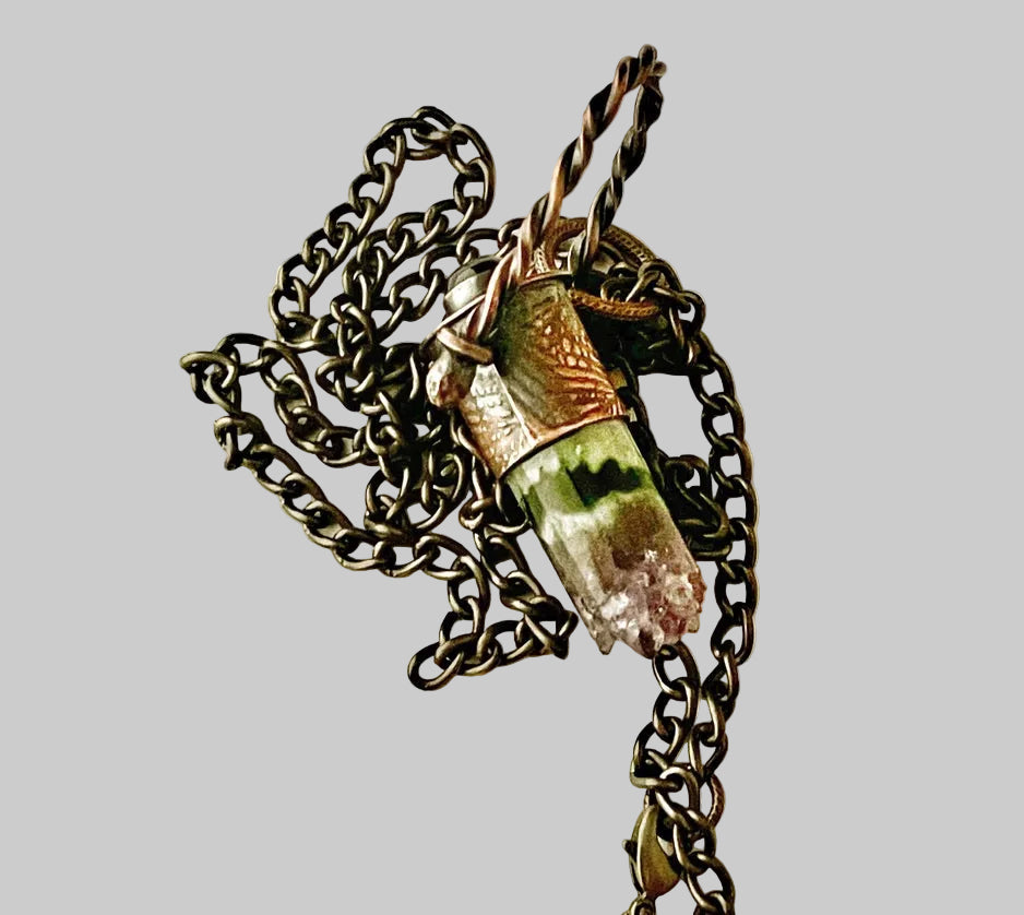 Stone pendant on twisted wire loop