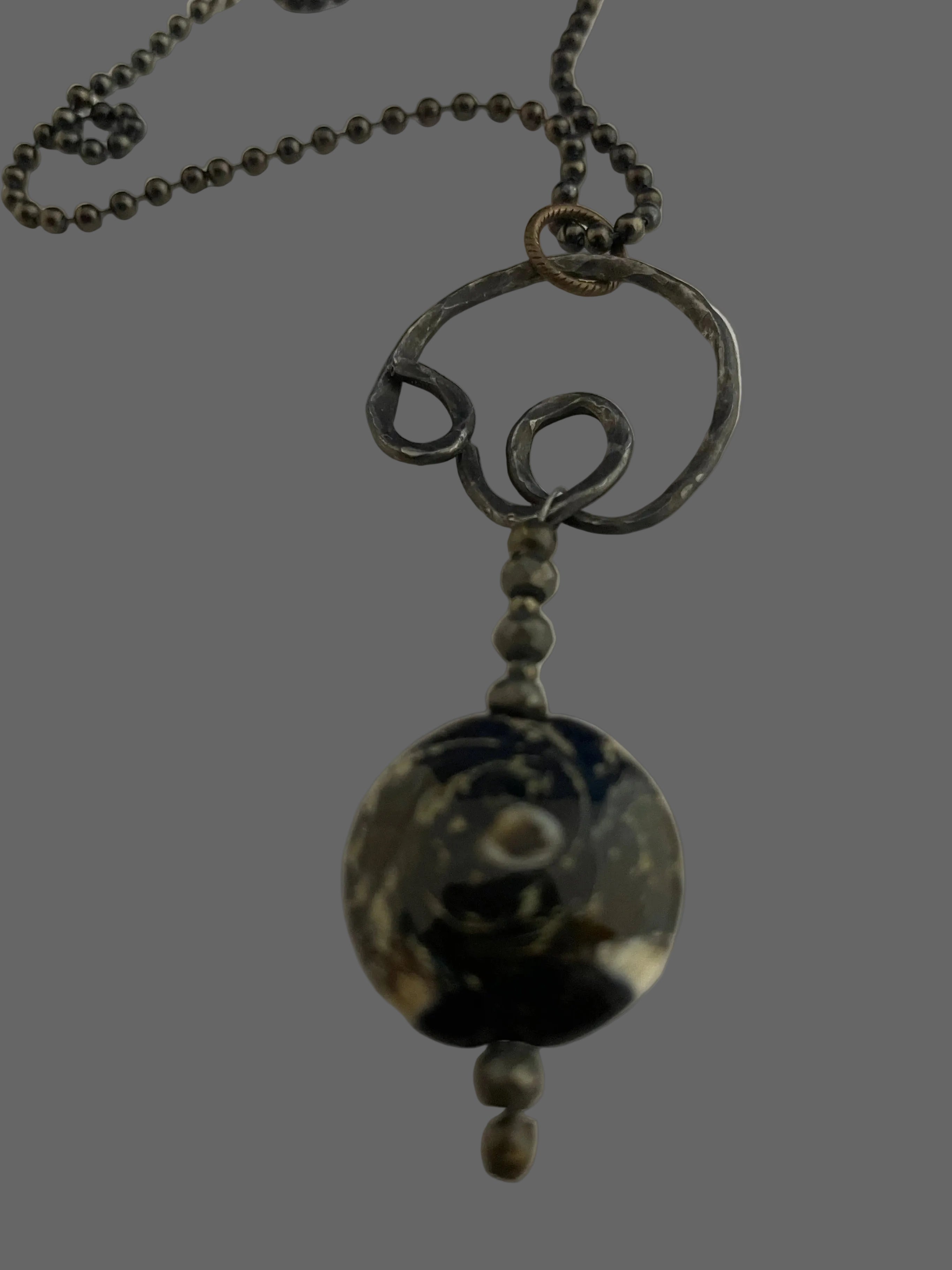 Steel and glass pendant