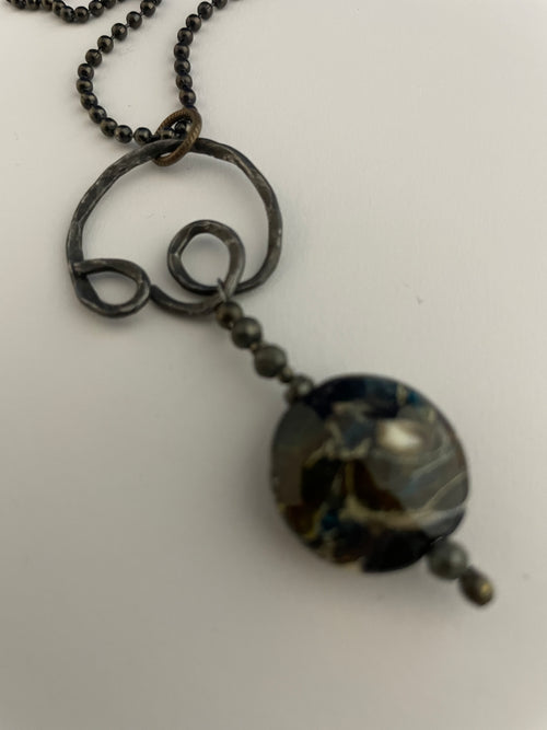 Steel and glass pendant
