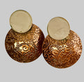 Copper earring with silver disk