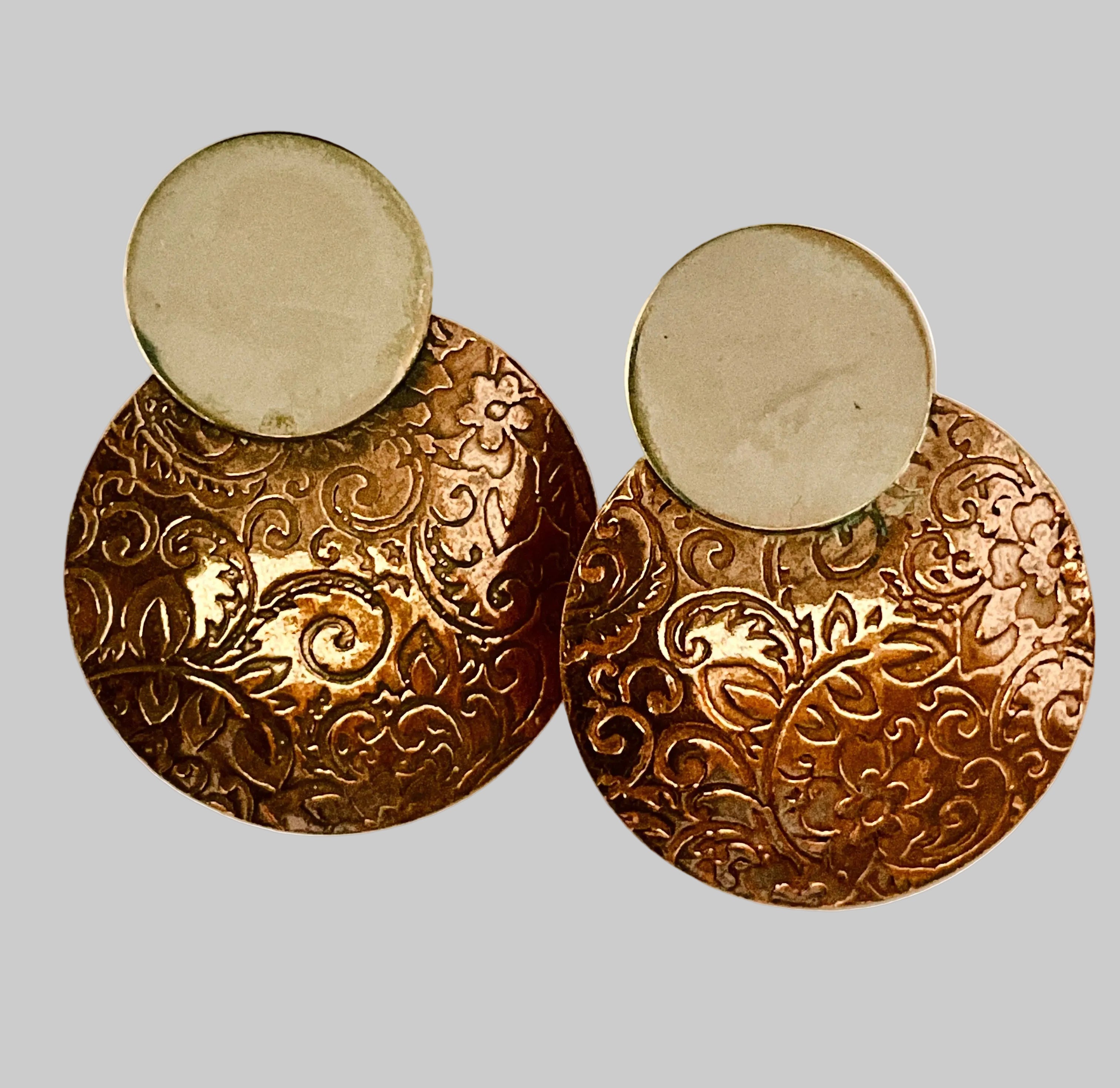 Copper earring with silver disk