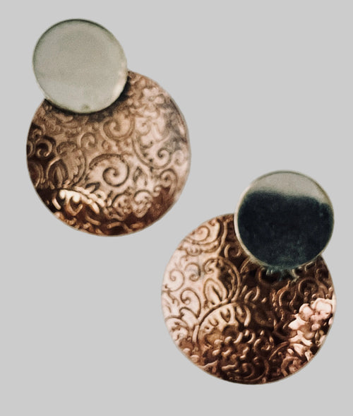 Copper earring with silver disk