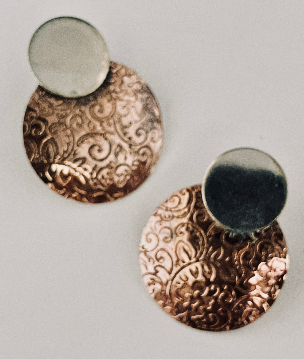 Copper earring with silver disk