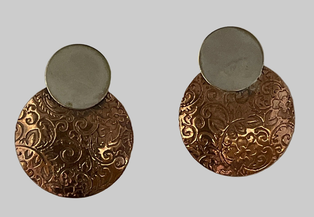 Copper earring with silver disk